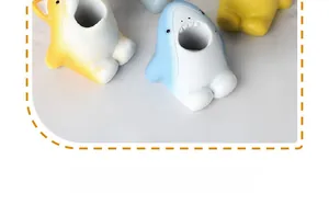 Detail view of cartoon animal nail drill bit holder with storage holes for sanding heads