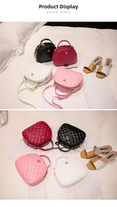 Group view of quilted semi-circle handbags in black, burgundy, white and pink colors