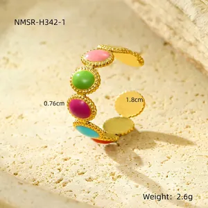 Detail view of 18K gold stainless steel open ring with colorful enamel inlay and dimensions