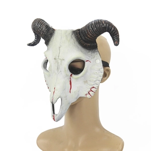 Side view of horror goat skull mask with black spiral horns and red blood splatter details