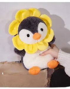 Detailed view of plush penguin doll with sunflower petals made of soft high-elastic fabric