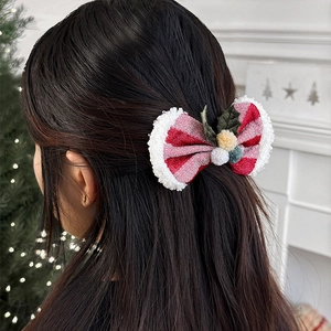 Pince à cheveux de Noël avec rayures rouges et blanches et décor de bois de renne
