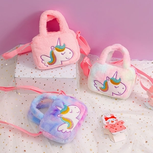 Detailed view of plush unicorn handbags with sequin embroidery and soft faux fur texture
