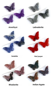 Detailed view of polished natural crystal butterfly ornaments in six gemstone varieties