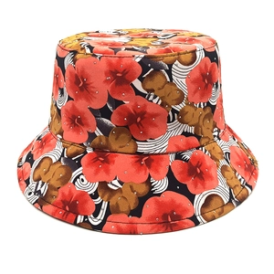Detail of red floral bucket hat with sparkling silver rhinestones and printed pattern