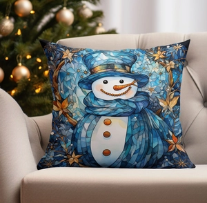 Artistic snowman pillow with blue glass effect on cozy sofa near decorated Christmas tree