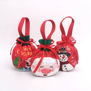 Three red and green Christmas drawstring gift bags with Merry Christmas prints