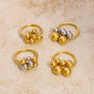 Polished stainless steel cluster rings set with gold and silver bead spheres