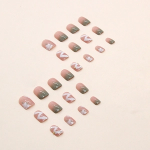 Green and pink gradient press-on nails with white flowers and pearl accents