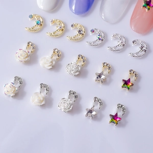 Star and moon nail charms with white camellia flowers and rhinestones for manicure art