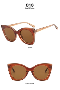 Front and side views of amber cat eye anti-blue light glasses with bold frames