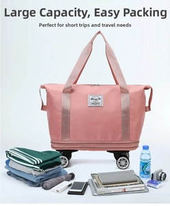 Pink large capacity travel bag with spinner wheels and expanded storage compartments