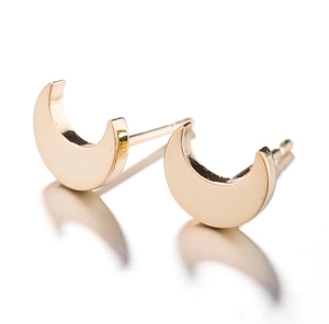 Close-up of polished 18K gold-plated crescent moon stud earrings for women
