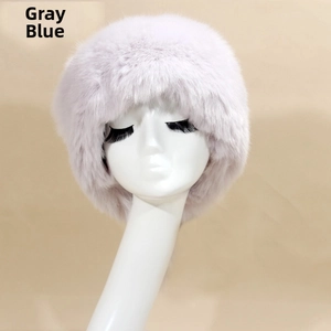 Detailed texture of thick gray-blue faux fur winter hat on a display head model
