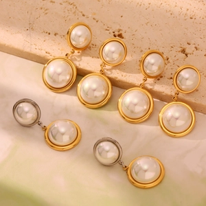 Vintage round earrings with large white pearls in gold and silver stainless steel frames