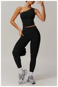 Vue de face du haut de sport à une épaule et du legging de yoga noir à taille haute