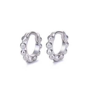 Minimalist S925 silver hoop earrings with a beaded punk style texture on a white background