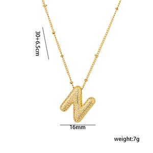 Detail of 18K gold letter N pendant with micro-pave crystals and 30+6.5cm chain dimensions