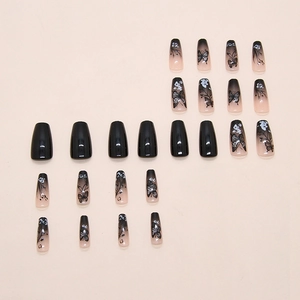 Black and pink gradient press-on nails with dark butterfly and floral patterns