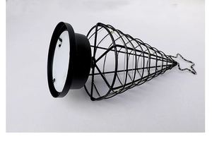 Close-up of modern black metal wire cone lamp with solar panel and LED string lights