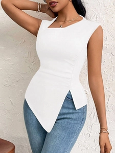 Detail of white slim fit sleeveless top with asymmetrical hem and diagonal neckline