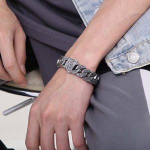 Retro 304 stainless steel Cuban chain bracelet with intricate vintage floral carvings