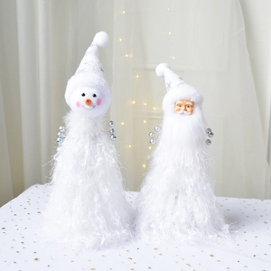 Macro detail of plush Santa and Snowman conical figurines with silver star sequins