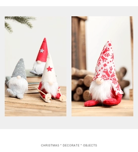 Detailed view of handcrafted Christmas gnomes with ski accessories and festive textures