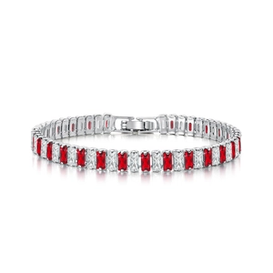 Detail view of silver tennis bracelet with alternating red and white baguette cut zircons