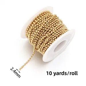 Detail view of 2.4mm gold plated stainless steel ball chain on a 10-yard roll
