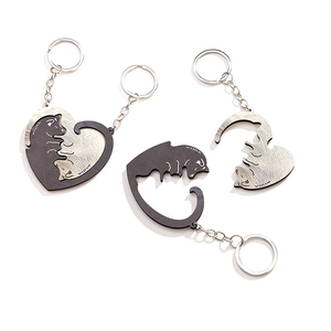 Cat couple keychain set with interlocking heart design in polished silver and black metal