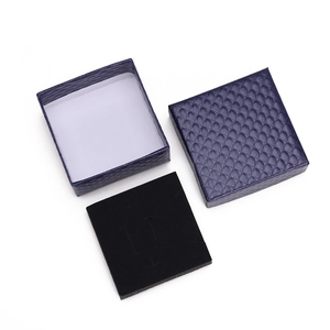 Dark blue rhombus pattern square jewelry box with black velvet lining and insert pad