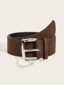 Macro view of brown nubuck leather belt with polished silver square buckle and stitching