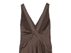 Detail of coffee brown satin dress featuring deep V-neck and cross-back straps