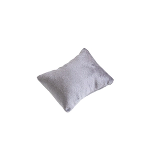 Gray fabric jewelry display pillow for bracelets and watches with fine fabric texture