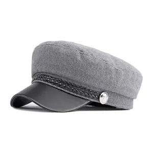 Classic grey wool baker boy hat with black faux leather brim and metallic button detail