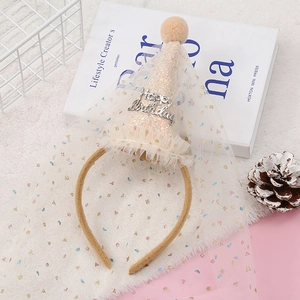 Detail of beige glitter party hat headband with Happy Birthday text and polka dot veil
