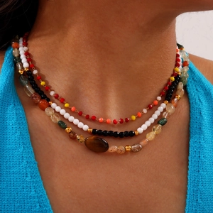 Bohemian multilayered necklace with natural stones and colorful beads on gold titanium steel