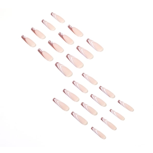 French press-on nails in nude and brown swirl patterns on long coffin-shaped nail tips