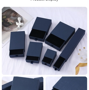 Blue drawer-style jewelry gift boxes in various sizes for rings and necklaces