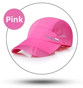Detailed side view of pink sports baseball cap with mesh panels and silver metal trim