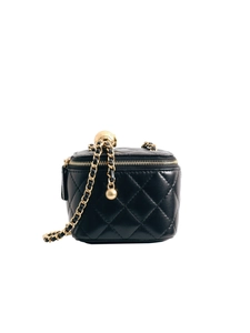 Black quilted sheepskin mini cosmetic bag with gold-tone ball chain and metal hardware