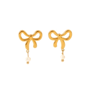 Close-up of golden stainless steel bow earrings with delicate pearl pendant charms