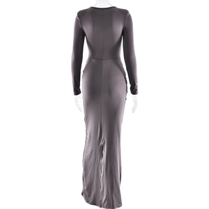 Detail view of the slim fit back and slit fishtail hem of this grey long sleeve maxi dress
