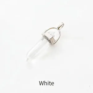 Detail of a transparent hexagonal crystal pillar pendant with silver metal clip attachment