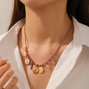Colorful woven cord necklace featuring lucky charm pendants and golden accents for women
