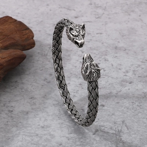 Nordic Viking wolf head bangle in antique silver finish with woven steel texture