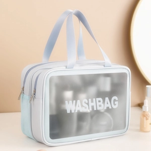 Large blue waterproof PU travel wash bag with double handles and clear window display