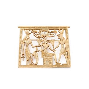 Baroque style gold Egyptian pharaoh brooch with vintage metallic texture in cutout design