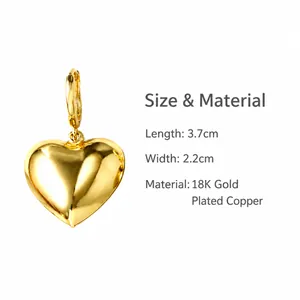 Close-up of 18k gold plated heart pendant showing polished texture and hook details